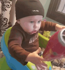 Baby Surprised GIF - Baby Surprised Hairdryer GIFs