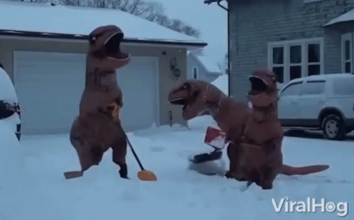 Dinosaurs Snowball Fight GIF - Dinosaurs Snowball Fight Shoveling - Discover &amp; Share GIFs