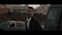 Adam Levine Wait GIF - Adam Levine Wait Suit GIFs