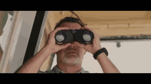 Wilson? GIF - Tom Hanks Wilson Binoculars GIFs