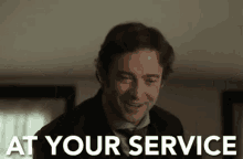 At Your Service GIF - Hugh Jackman At Your Service The Greatest Showman GIFs
