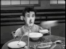 Charlie Chaplin Cake GIF - Charlie Chaplin Cake Funny GIFs