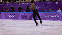 Ice Skating Winter Olympics2022 GIF - Ice Skating Winter Olympics2022 Turning In The Air GIFs