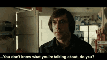 Anton Chigurh No Country For Old Men GIF - Anton Chigurh No Country For Old Men You Dont Know What Youre Talking About GIFs
