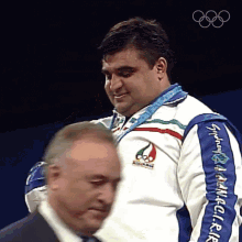 Kissing The Gold Medal Hossein Rezazadeh GIF - Kissing The Gold Medal Hossein Rezazadeh Olympics GIFs