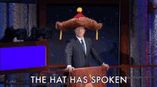 Stephen Colbert Big Furry Hat GIF - Stephen Colbert Big Furry Hat The Hat Has Spoken GIFs