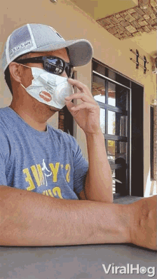 Drinking Viralhog GIF - Drinking Viralhog Baby Wipe Mask GIFs