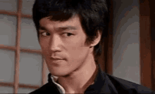 Bruce Lee Frown GIF - Bruce Lee Frown Disapprove GIFs