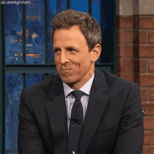 Seth Meyers Trying Not To Laugh GIF - Seth Meyers Trying Not To Laugh Smile GIFs