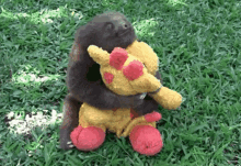 Baby Sloth Lie Down GIF - Baby Sloth Lie Down Stuffed Toy GIFs