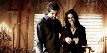Cole Michaelson Davina Claire GIF - Cole Michaelson Davina Claire Showing Him About Magical Items GIFs