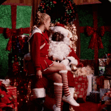 Glee Quinn Fabray GIF - Glee Quinn Fabray Sitting On Santas Lap GIFs