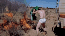 Breaking Bad Putting Out Fire GIF - Breaking Bad Putting Out Fire Fire GIFs
