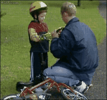 How To Teach Your Kid To Ride A Bike GIF - Throwing Biking Teach GIFs