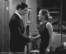 Clark Gable Joan Crawford GIF - Clark Gable Joan Crawford Tap GIFs