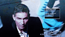 person of interest john reese camera evaluating recording