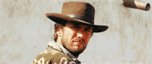 man with no name clint eastwood the good the bad and the ugly straight face cowboy