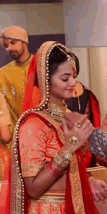 swaragini swara maheshwari hellyshah orange lehenga bridal
