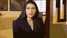 Girl In Corporate Suit Making Faces GIF - Girl In Corporate Suit Making Faces Boo GIFs