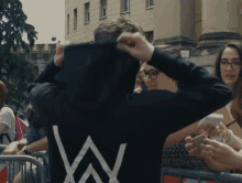 Put Hood On Hoodie On GIF - Put Hood On Hoodie On Interacting With Fans GIFs