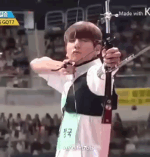 Jungkook Archery GIF - Jungkook Archery Bulls Eye GIFs