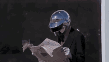 Reading Newspaper GIF - Reading Newspaper Daft Punk GIFs