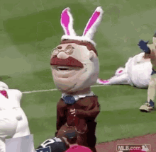 Easter Bunny Tackle GIF - Easter Bunny Tackle Mascot GIFs