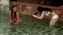 You Have To Buy Your Bikini Tops And Bottoms Separately. GIF - Photoshoot Bikini Dipping GIFs