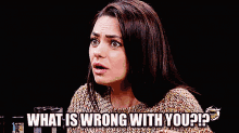 Mila Kunis Hot Ones GIF - Mila Kunis Hot Ones What Is Wrong With You GIFs