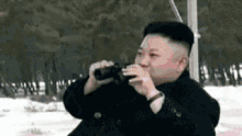 Kim Jong Un Binoculars GIF - Kim Jong Un Binoculars Half Naked GIFs