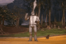 The Tin Man Tooting GIF - Toot Tin Man Wizard Of Oz GIFs
