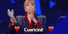 Milly Carlucci Cuoricini GIF - Milly Carlucci Cuoricini Il Cantante Mascherato GIFs