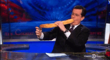 Playing With Your Food GIF - Steven Colbert Baguette Bread GIFs