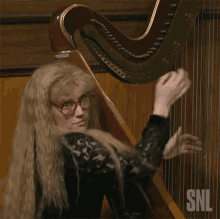 Playing Harp Kate Mckinnon GIF - Playing Harp Kate Mckinnon Saturday Night Live GIFs