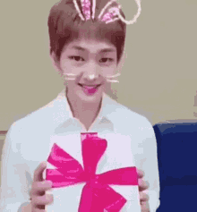 Pianistchenle Shinee Lee Jinki Onew Bunny Ears Smiling Happy Gift Present GIF - Pianistchenle Shinee Lee Jinki Onew Bunny Ears Smiling Happy Gift Present GIFs