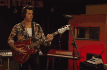 Playing Guitar Mark Ronson GIF - Playing Guitar Mark Ronson Then There Were Two GIFs