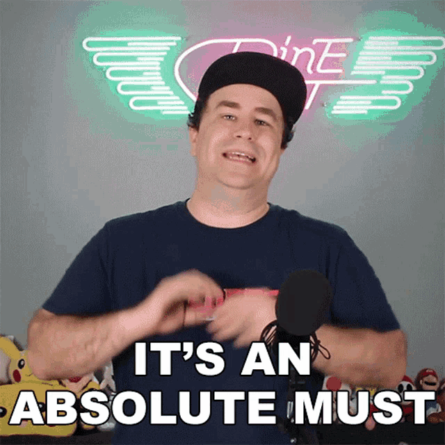 Gif a gif of a man saying its an absolute must
