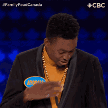 Brush Off Ayodele GIF - Brush Off Ayodele Family Feud Canada GIFs