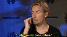 Chad Kroeger Hold On My Nose Itches GIF - Chad Kroeger Hold On My Nose Itches My Nose Itches GIFs