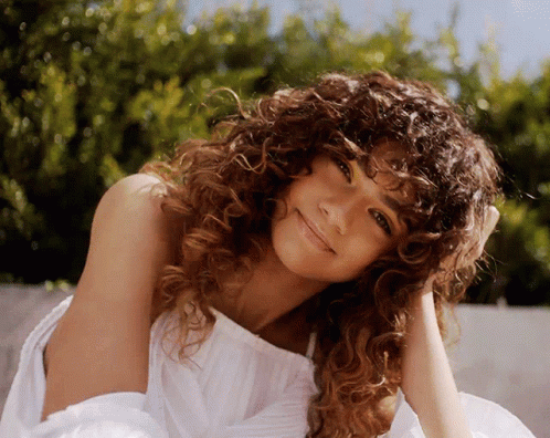 Zendaya Curly Hair GIF - Zendaya Curly Hair Smirk GIFs