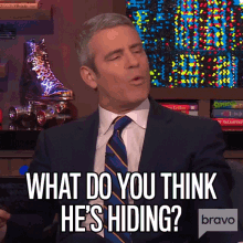 What Do You Think Hes Hiding Andy Cohen GIF - What Do You Think Hes Hiding Andy Cohen Watch What Happens Live GIFs