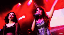 dulce maria manu gavassi performing singing on stage dulce maria manu gavassi performing singing on stage