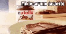 Mi Desayuno Favorito Con Nutella GIF - Nutella Bread Spread GIFs
