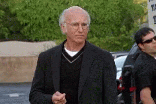 Gif of a confused man who is unsure about what he just heard