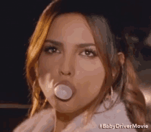 Blowing A Bubble GIF - Eiza Gonzalez Bubble Gum Baby Driver GIFs