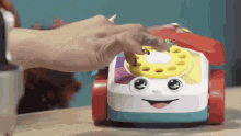Toy Phone Dialing GIF - Toy Phone Dialing Spinning GIFs