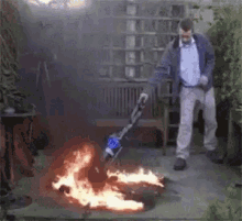 Putting Out Fire Vacuming GIF - Putting Out Fire Vacuming GIFs