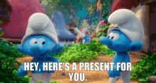 The Smurfs Jokey Smurf GIF - The Smurfs Jokey Smurf Hey Heres A Present For You GIFs
