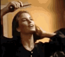 Blond Combing GIF - Blond Combing Smile GIFs
