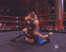 rhea ripley punching punch wrestling punch in the face